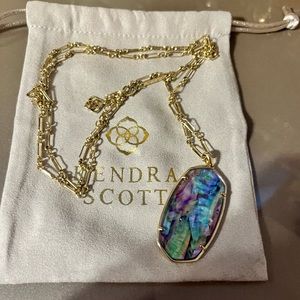 Long gold adjustable necklace with multi color pendant